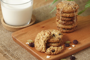 Oat raisin cookies on chopping board