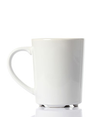 White ceramic mug. Isolated on a white.