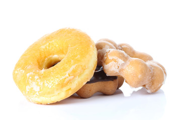 various donuts on white background