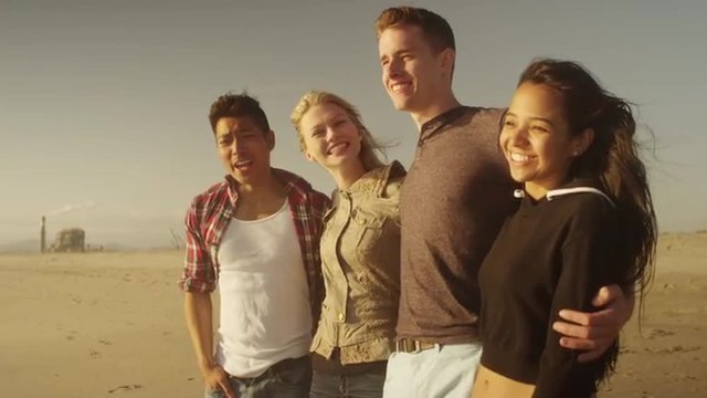 Best friends laughing and having fun at the beach