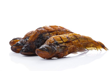 Grilling fish  of countryside in thailand by fire and smoke.