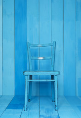 Old Blue Chair Vintage in The wood wall room 