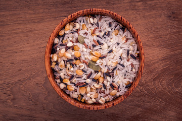 Mixed Whole grain Traditional Thai rice in the spoon and bowl be