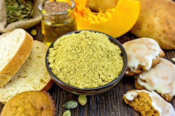 Flour pumpkin in bowl with baking on board