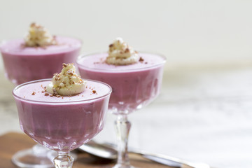 Boysenberry Flummery Decorated with Cream and Chocolate with Copy Space - Selective Focus