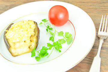 Eggplant Stuffed with and Tomatoes.