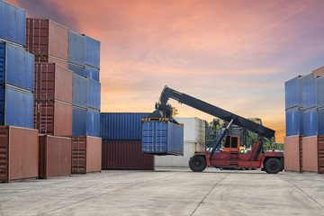 forklift handling the container box in logistic zone