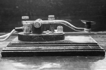 old morse key telegraph on wood table - obrazy, fototapety, plakaty