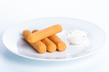 Fototapeta na wymiar Crispy cheese sticks deep-fried on a white background