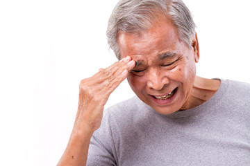senior man suffering from headache, stress, migraine