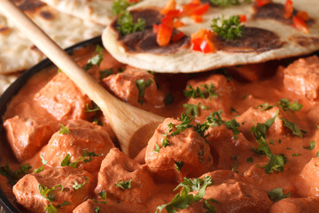 tikka masala chicken macro on a plate. horizontal