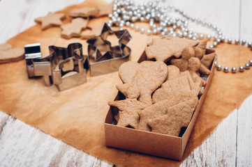 Christmas ginger cookies on wooden background