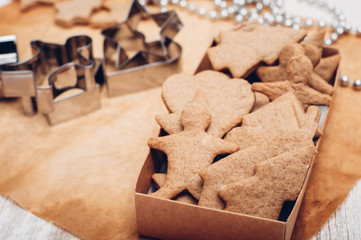 Christmas ginger cookies on wooden background