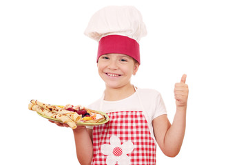 happy little girl cook with crepes and thumb up