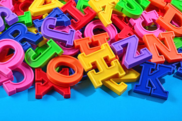 Fototapeta premium Colorful plastic alphabet letters