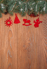 Christmas wooden background with fir tree and decor