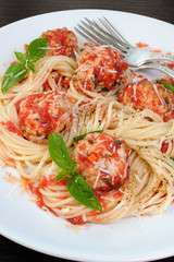 Pasta in tomato gravy with meatballs