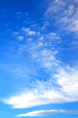 in the blue sky white  clouds and abstract background