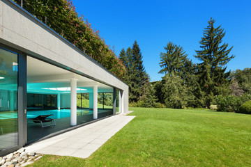 Modern house, garden with indoor pool, outdoors - obrazy, fototapety, plakaty