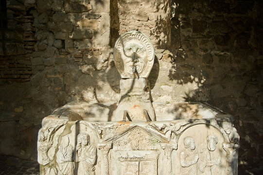 ancient sarcophagus fountain in Lanuvio