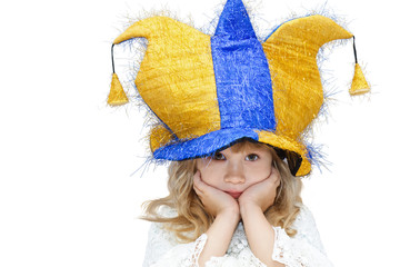 Little girl in a clown hat