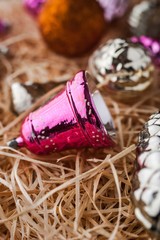 Glass Christmas tree bell on the filings