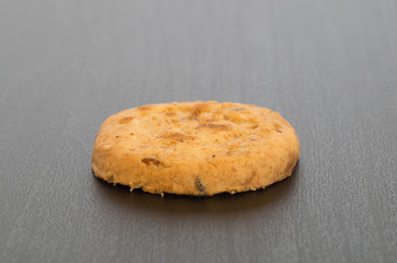 Lateral shot of a cookie on black table