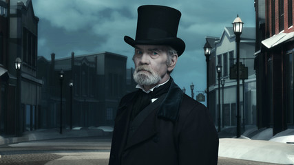 Dickens Scrooge Man in Old Winter Street. - obrazy, fototapety, plakaty