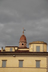 Yellow Building with Dark Stormclouds.