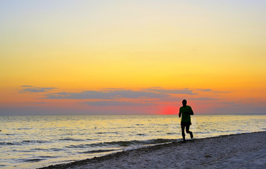 Fototapeta premium Running on the beach