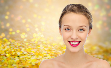 smiling young woman face and shoulders