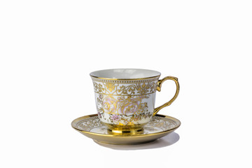 Antique tea cup on white background