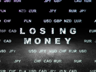 Currency concept: Losing Money in grunge dark room