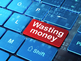 Fototapeta premium Banking concept: Wasting Money on computer keyboard background