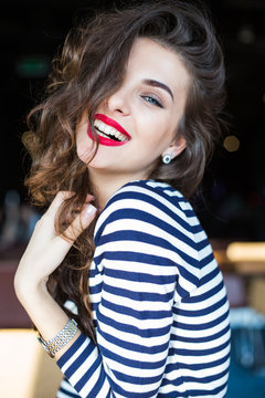 Fototapeta Close up portrait of beautiful smiling young woman