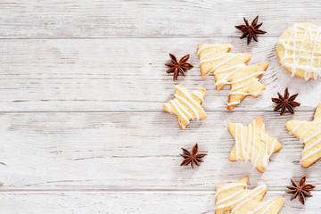 Christmas mood , festive cookies with  cinnamon on a wooden background