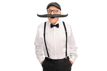 Joyful senior gentleman with a fake moustache