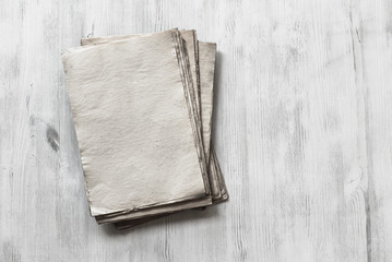 old papers on wooden background