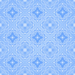 Seamless floral texture on blue.
