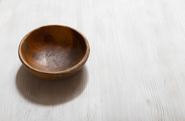 wooden bowl on white table