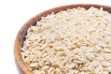 Oatmeal.  Bowl full of oats 