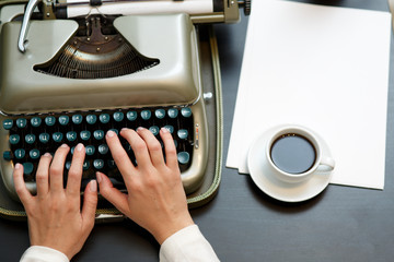 closeup of coffee and hands writing