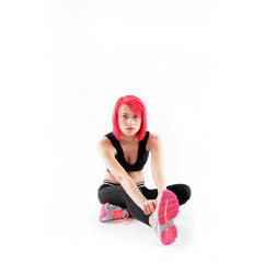 Rothaarige Frau mit Laufschuhe