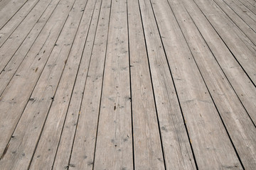 Vintage wooden surface with planks and gaps in perspective