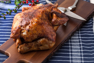 Baked chicken on white plate.