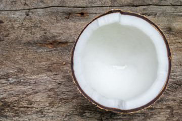 Coconut isolated on wood background
