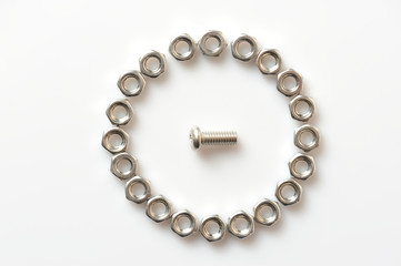Screw and nuts on white background