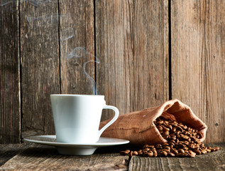Cup of coffee and coffee beans
