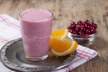 Smoothies and orange and cranberries .
