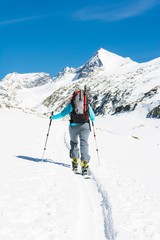 Fototapeta na wymiar Ski touring in sunny weather.